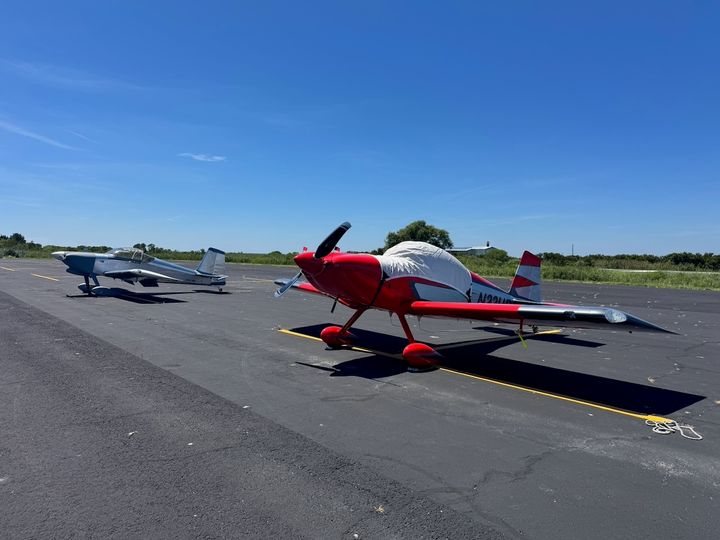 Two experimental RV aircraft parked on the apron at Tangier Island.