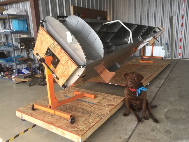 RV-8 fuselage section on a rotisserie in the workshop
